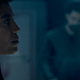 Naomi Nagata (Dominique Tipper) stares at a screen aboard the spaceship Rocinante in this scene from The Expanse.